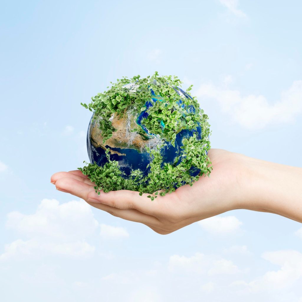 Sustainable living environmentalist hand holding green earth